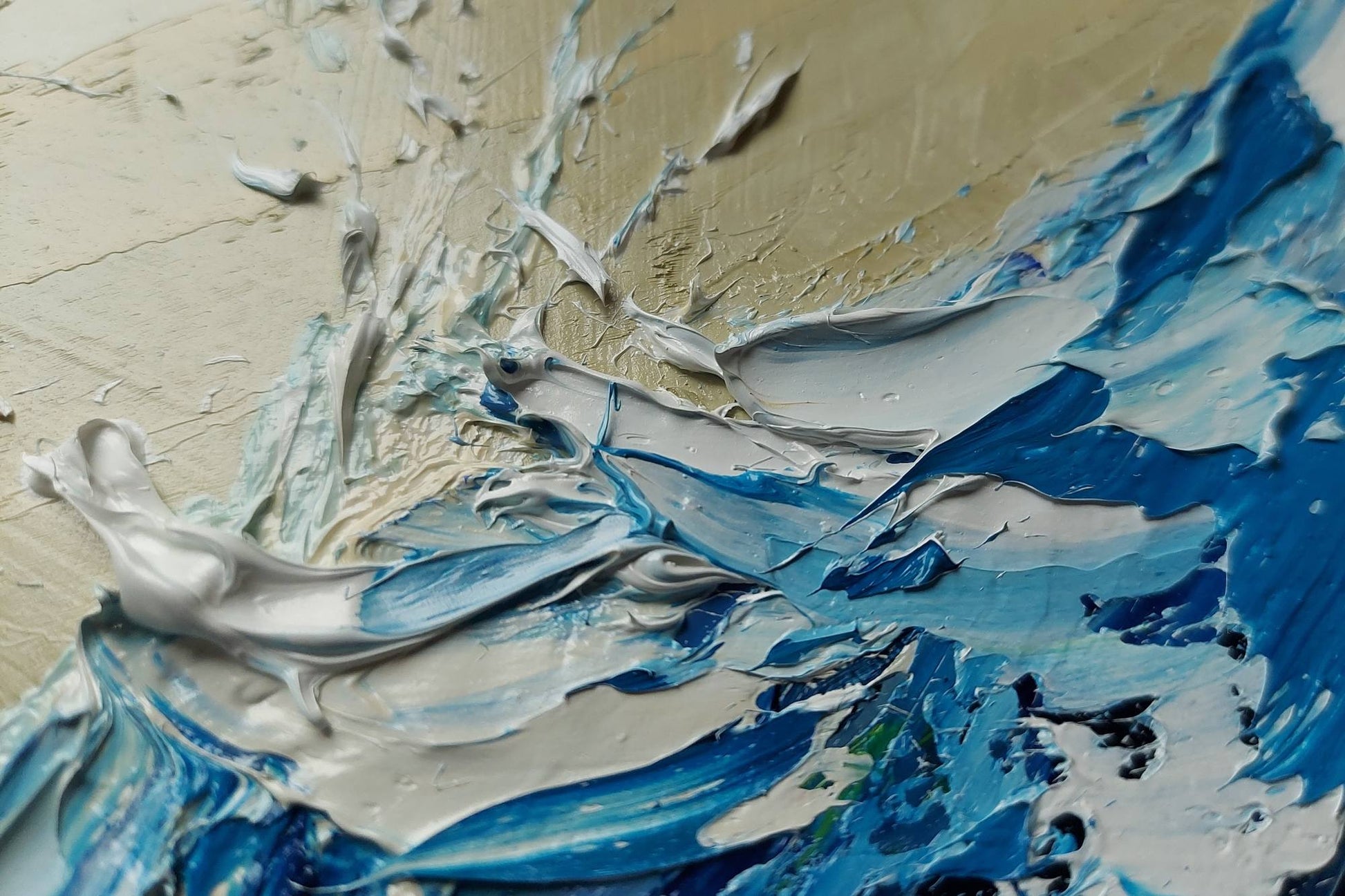 Abstract painting with blue and grey knife marks on a textured beige background